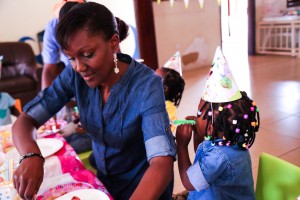 Rukh-Shana serves Twinkle toes cake on her  third birthday at a babies home